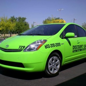 Green Discount Taxi Vehicle