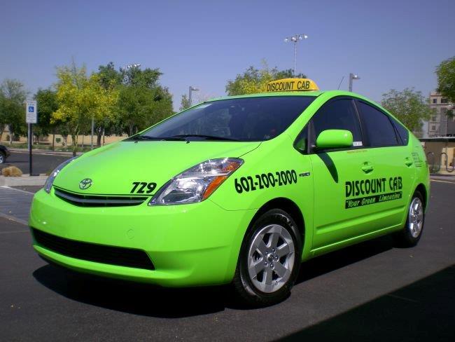 Green Discount Taxi Vehicle