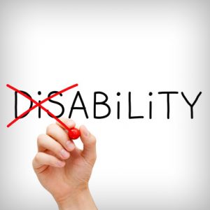 Hand with red marker turning disability into ability